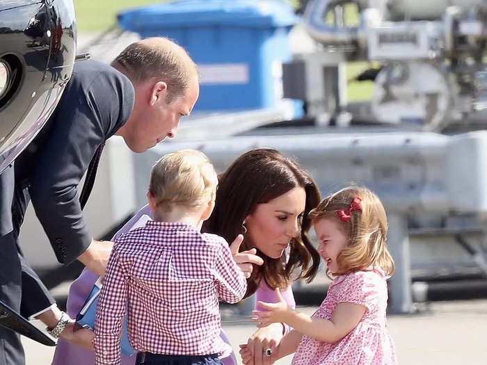 But Charlotte looked less than happy later as the family prepared for their flight home.