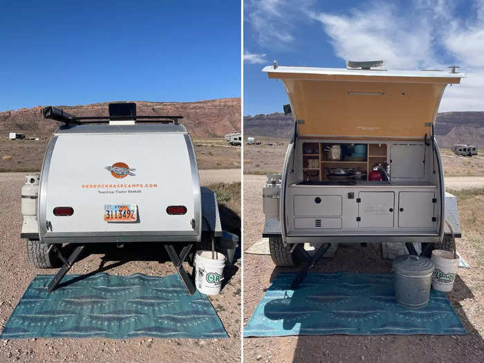 At the other end of the teardrop trailer, a garage-like door opened to reveal an entire kitchen setup.