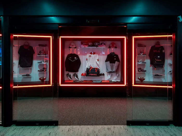 There is even a uniform display room. It is only accessible by facial recognition, has black mirrored acrylic walls and faux-leather vertical panels that slide to reveal uniforms and athletic gear.