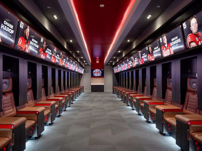Each locker has its own seat and a TV above with the player