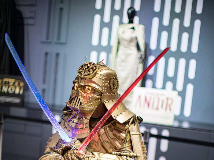 Screenwriter Christopher Canole is a Comic-Con staple in his golden "Dude Vader" cosplay, complete with samurai swords.