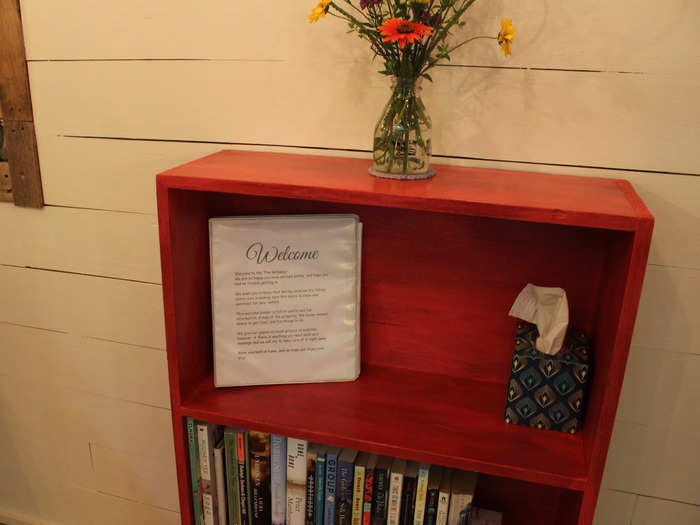 There was also a bookshelf inside the tiny house with a welcome book that listed all the house rules and gave some recommendations for things to do in the area.