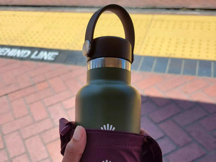 Insulated, refillable water bottles are important for staying hydrated in the sun.