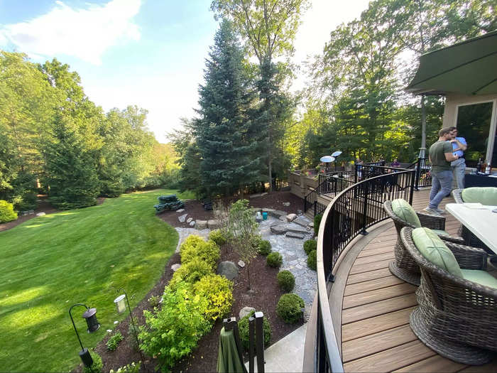 When not playing or watching games, Tucker hosts his guests on an expansive deck and well-manicured backyard.