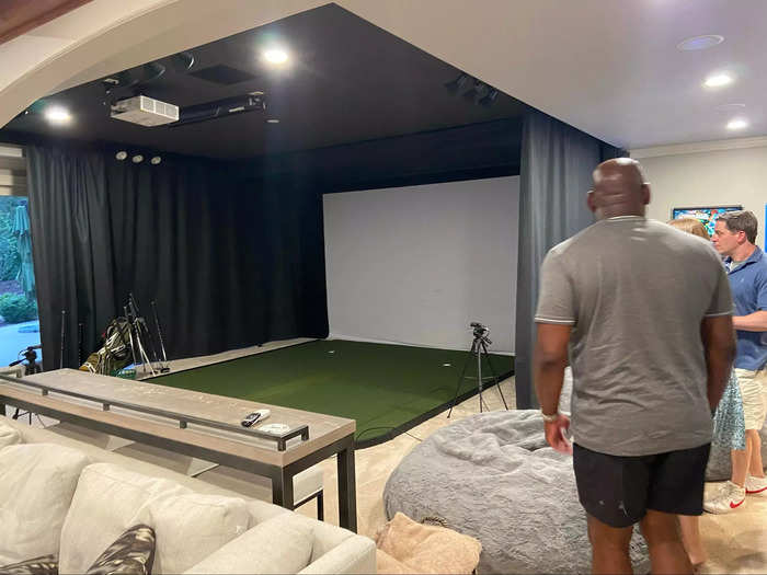 When not working on football, Tucker is grinding away on his golf game with a built-in home simulator, where he can play almost every major golf course in the world.