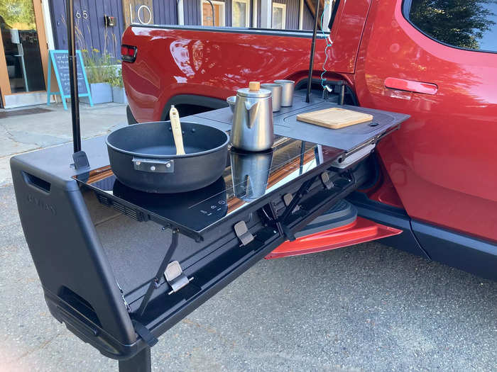 ... or a full camping kitchen complete with a burner, sink, cutting board, and cookware.