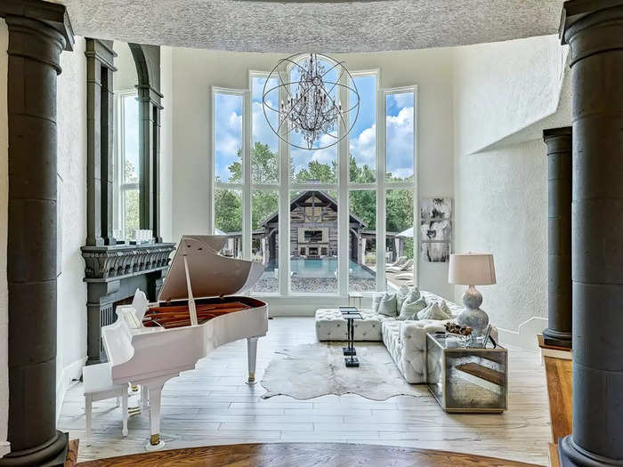 This fireplace room overlooks the pool area.