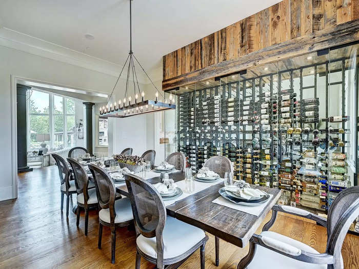 The dining area has plenty of storage for wine.