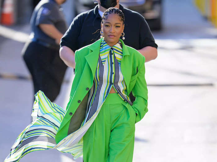 Palmer looked fierce in an oversized green suit and open-toe heels during an appearance on "Jimmy Kimmel Live!" in March 2022.