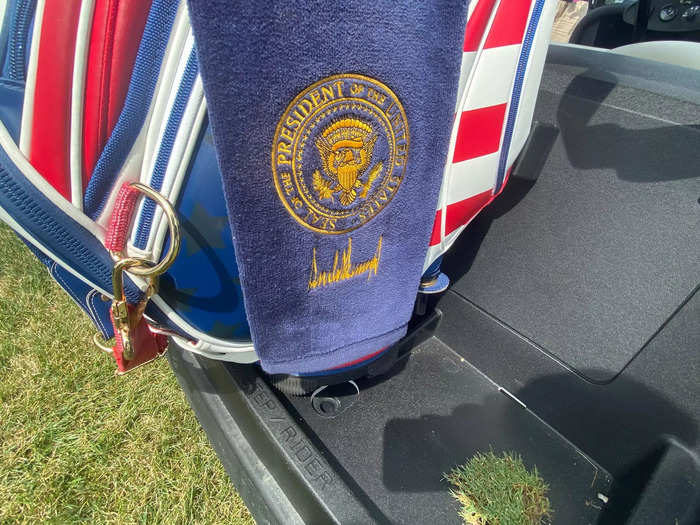 And his golf towel includes a presidential seal and his signature.