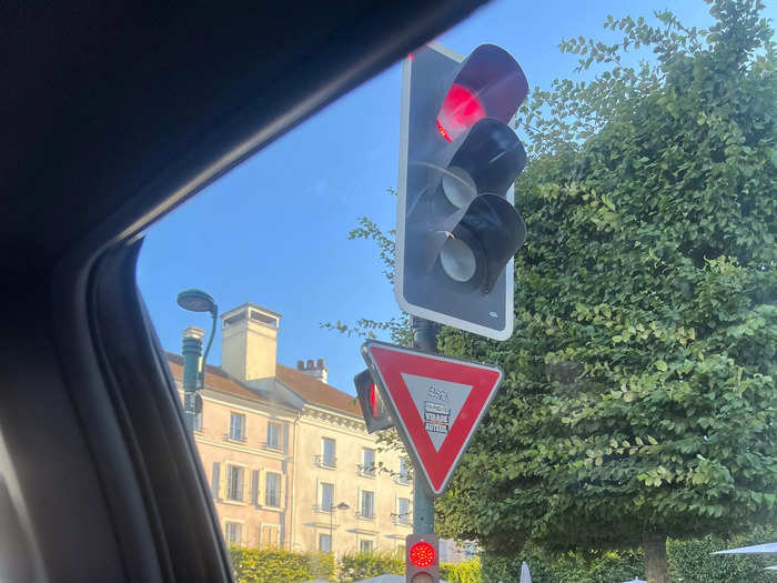 Extra tiny stop lights are seen at every traffic stop for cyclists and motorists.