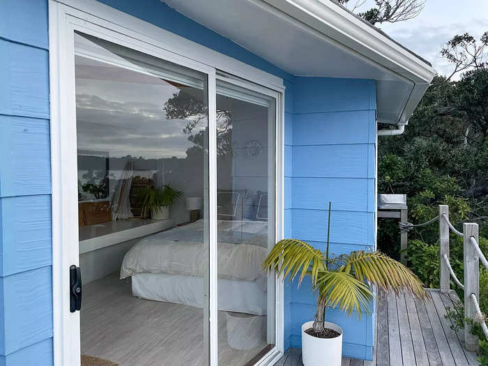 A sliding glass door from the deck opened to the small home.