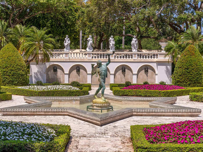 The park is dotted with fountains and statues.