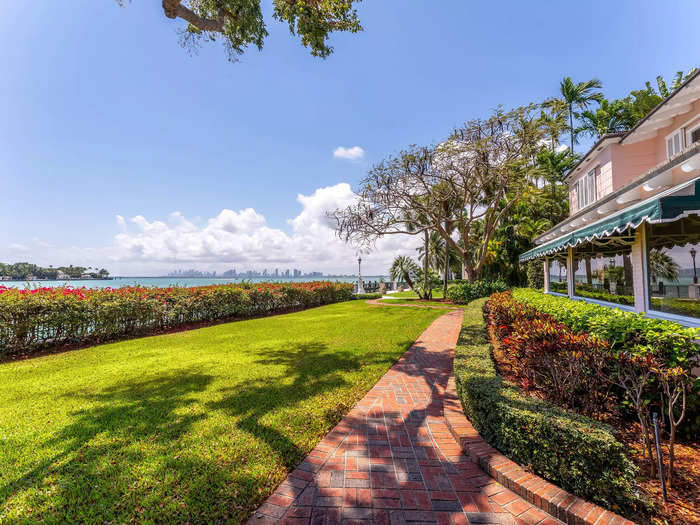 With its manicured lawn, it has more greenery than the first two homes.