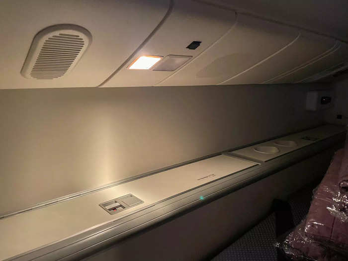 Along the edge of the bed, I spotted more cupholders and a control panel for the lights and airflow in the bed nook.