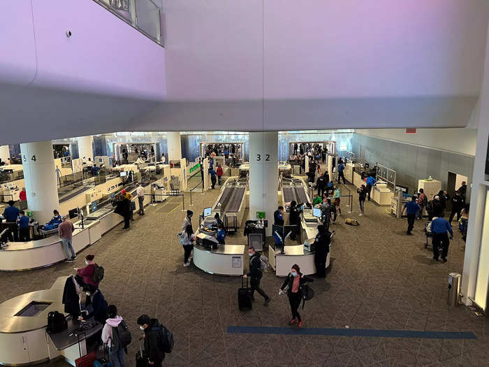 From security, passengers will climb an escalator to access the concourses.