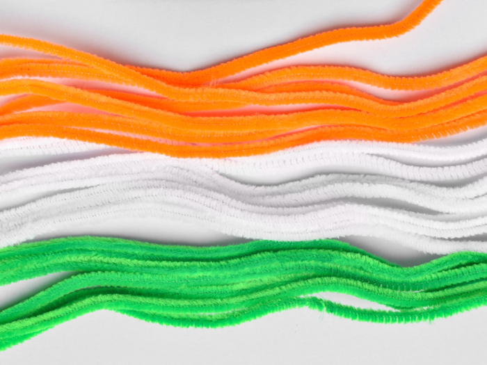 Which materials are allowed in the making of the Indian National Flag?