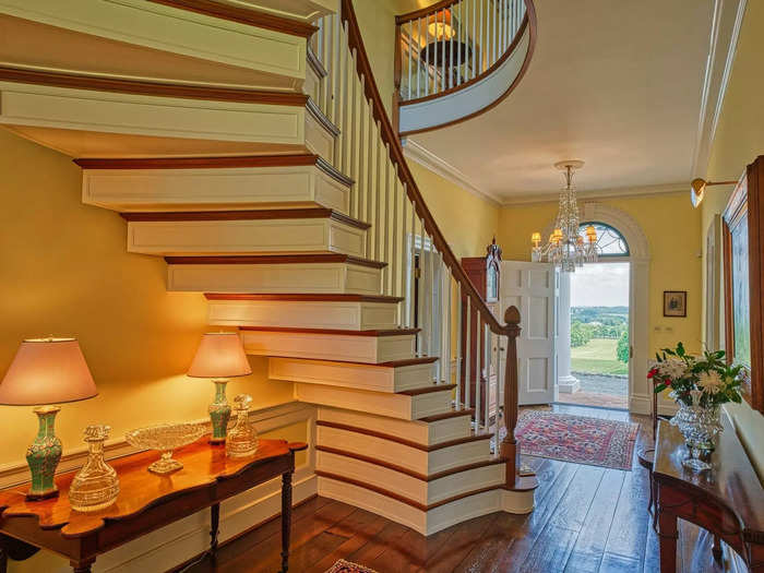 The staircase was designed for the previous owners using wood from walnut trees on the property, Leonard-Morgan said.