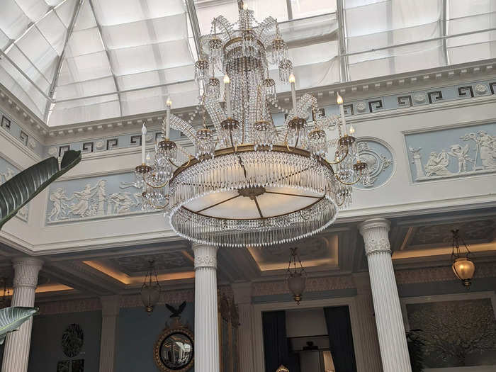 I felt like I was stepping back in time as I entered the elegant Lanesborough Grill restaurant, which featured multiple grand chandeliers and Roman-themed columns.