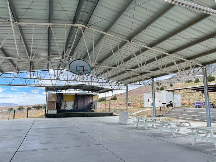 Also on the property is a modern pavilion with a stage, picnic tables, and a basketball court, which Iosepa