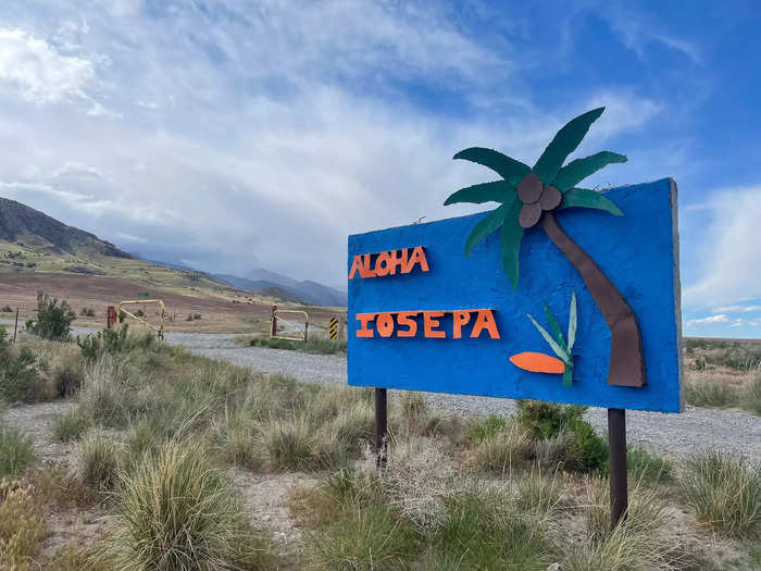 Finally, "Aloha Iosepa" in bright-orange letters on a cobalt-blue sign came into view.