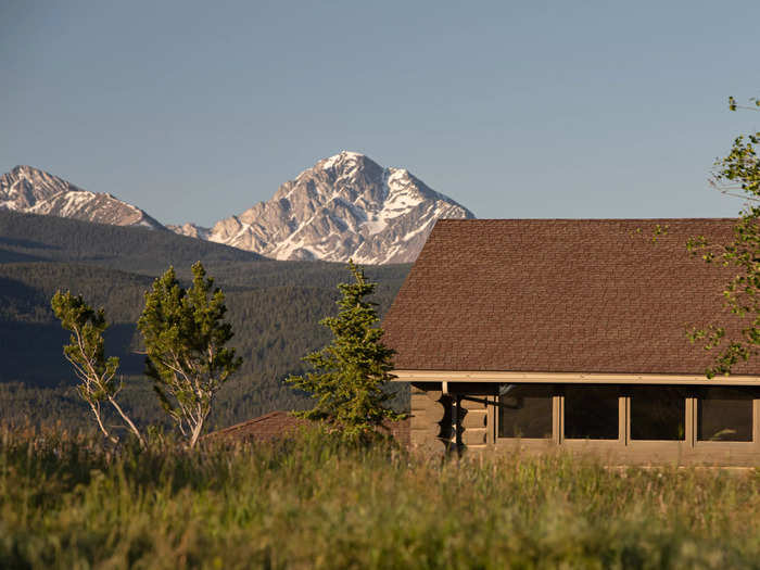 The 5-bedroom home is constructed from logs salvaged from a wildfire in Oregon, she said, because they didn