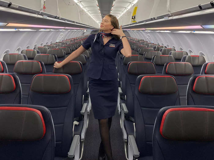 Leah, a flight attendant for a major US airline, described how her job has changed since the pandemic. She said the position consists more of consoling, comforting, and de-escalating passengers than it did previously.