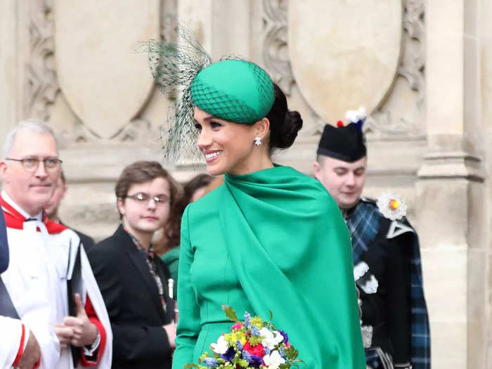 The Duke and Duchess of Sussex announced their step back from royal duties in January 2020. For her final engagement as a working royal in March, Markle stood out in an emerald Emilia Wickstead cape dress.