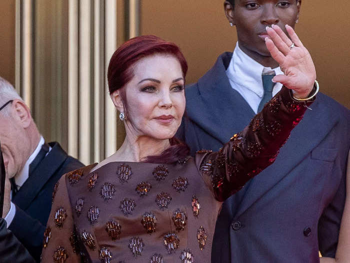 Presley wore a burgundy-colored Prada dress with sequin embellishments to the Cannes premiere of "Elvis."