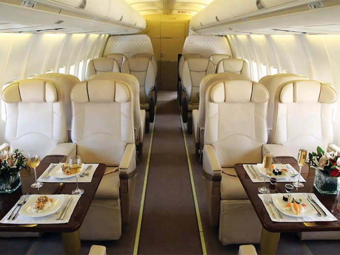 The front of the plane has four sets of loungers facing each other in a 2x2 configuration. These convert into the dining spaces.