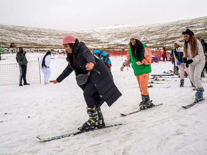 While vacation makers pass the sunscreen and look to get out of the heat this summer, holidaymakers in an African kingdom are clipping on their skis and sipping on mulled wine.