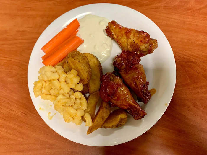 The wings were okay but fairly bland, and the macaroni and cheese was shockingly flavorless.