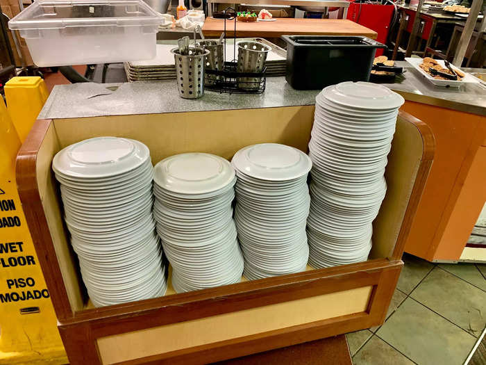 I started out grabbing a plate, still warm, from the large stack.