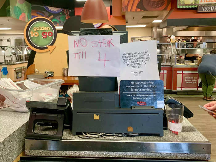 A hand drawn sign at the register reminded customers that steak isn