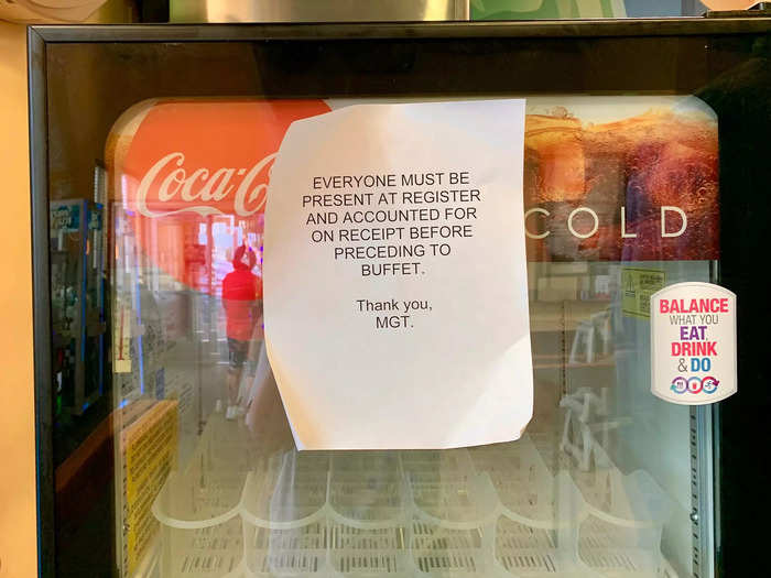 There were printed out signs posted all over the restaurant with instructions, like this one requiring that all customers must be present at the register before entering the buffet.