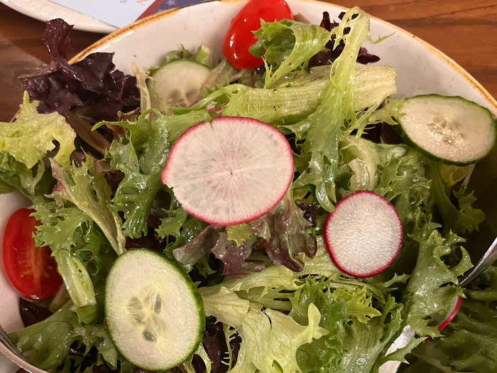 The all-you-can-eat menu was filled with classic American foods, starting with a mixed-green salad.