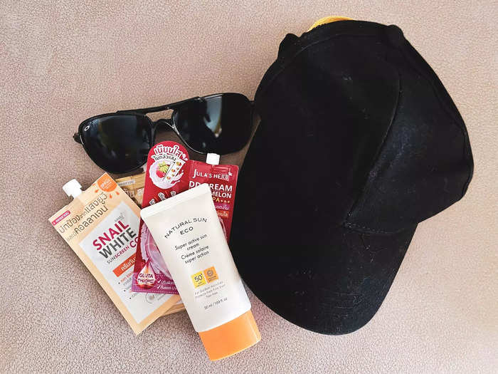 3. Pack sunscreen, sunglasses, and a hat.