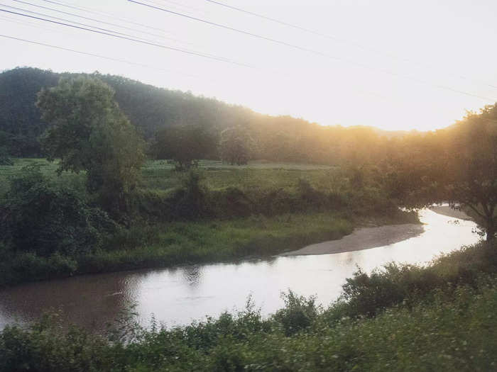 The train also meandered along winding rivers during golden hour — it was a stunning sight. After a brief stop at Nakhon Lamphang, the rest of the trip quickly slipped into darkness.