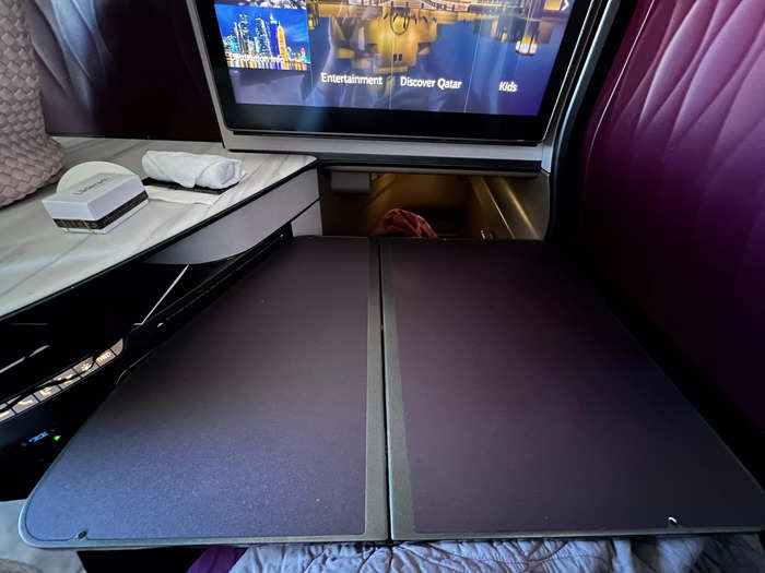 The tray table was tucked under the TV and had plenty of space to eat and drink comfortably.