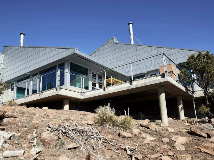 The 4,000-square-foot brutalist home is complemented by 3,000 square-feet of outdoor living spaces, giving its residents more than enough space to hunker down.