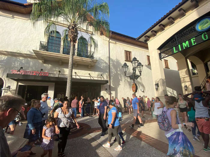 As Disney Springs fills with tourists, lines become extremely long. At popular restaurants like The Polite Pig, where reservations are not suggested, there