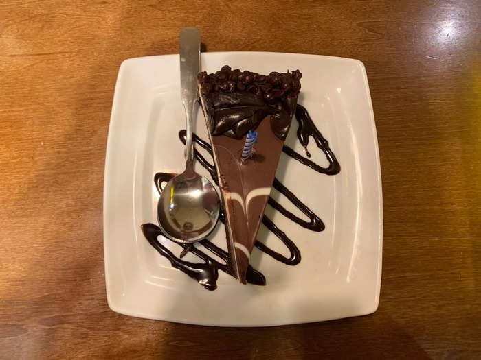 I told the waiter it was my birthday, and he returned with a fleet of employees who clapped, sang, and delivered a slice of cake worth $12.29. I was mostly delighted and only a little bit embarrassed.