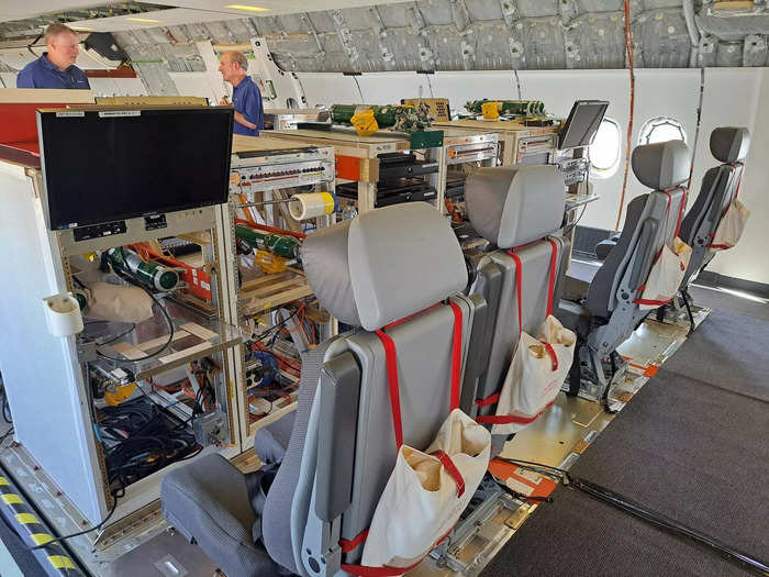 Each bank, which includes a TV screen and other tools, monitors a different part of the plane