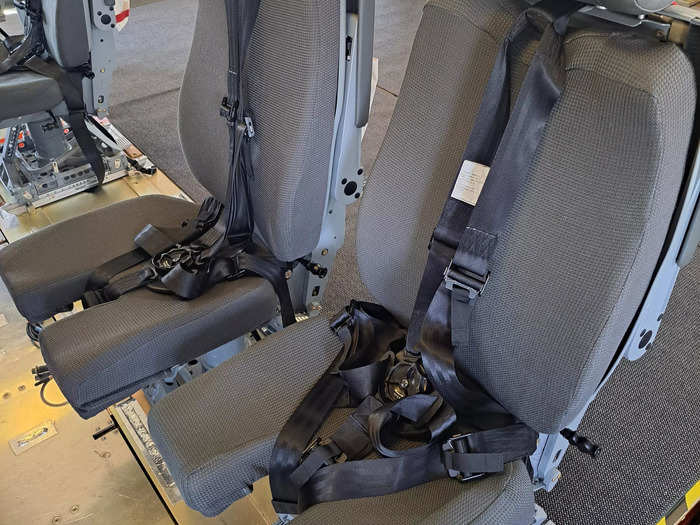 The seats are padded and come with a drink holder and a five-point harness.