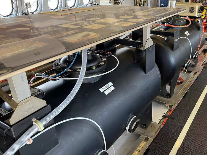 Inside the jet is a slew of testing equipment and tools, with one of the most important being the large black water tanks located at the front and back of the plane.