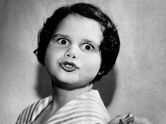 April 18, 1955: 8-year-old Ann Hill gets the polio vaccine.