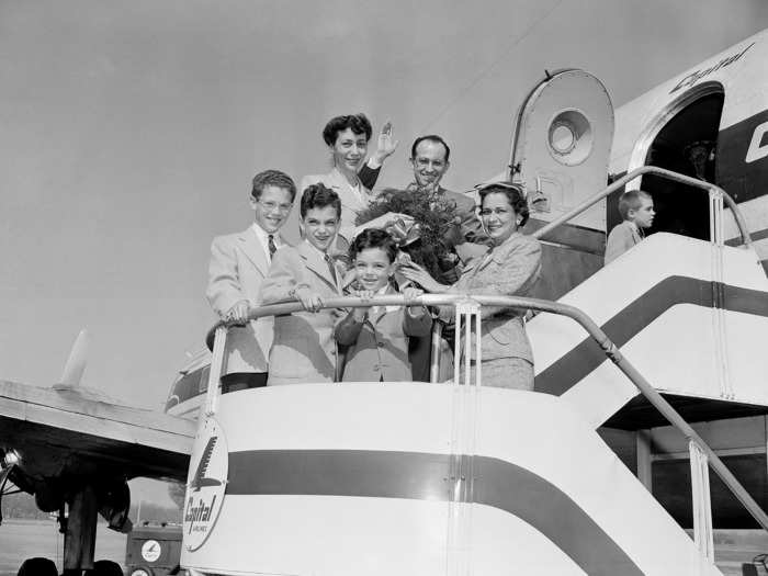 April 16, 1955: Dr. Jonas Salk arrives in Pittsburgh, PA by plane with his family after his polio vaccine is determined to be 90% effective.