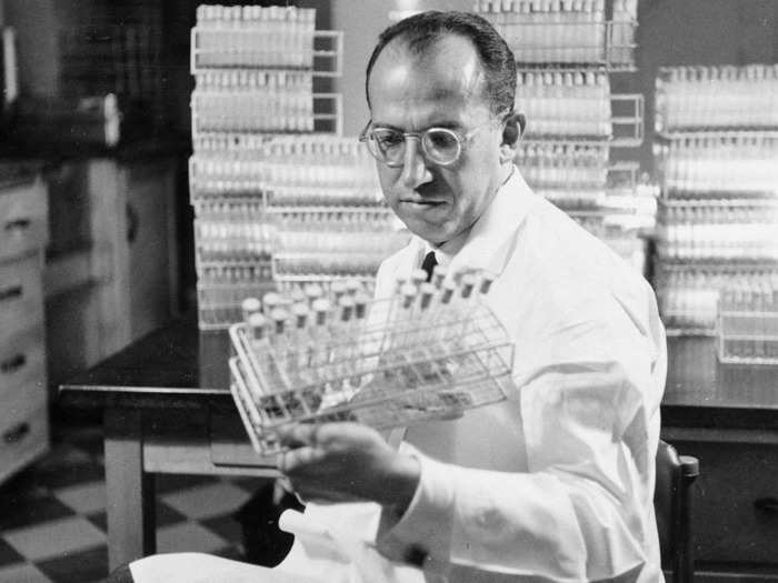 October 7, 1954: Developer of the polio vaccine, Dr. Jonas Salk in a laboratory in Pittsburgh, Pennsylvania.