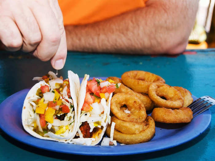 Eat a filling meal before the flight.