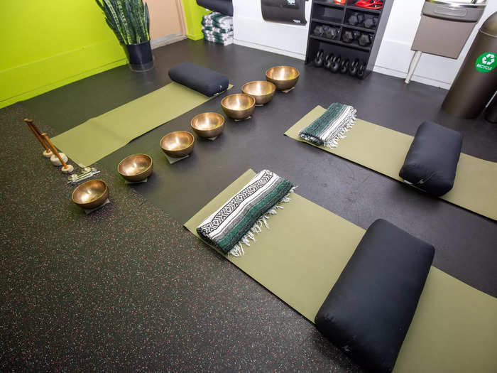 The integration of "sound healing" through singing bowls and color therapy through changing LED lights on the ceiling may seem "woo-woo" and counterintuitive to a workout that